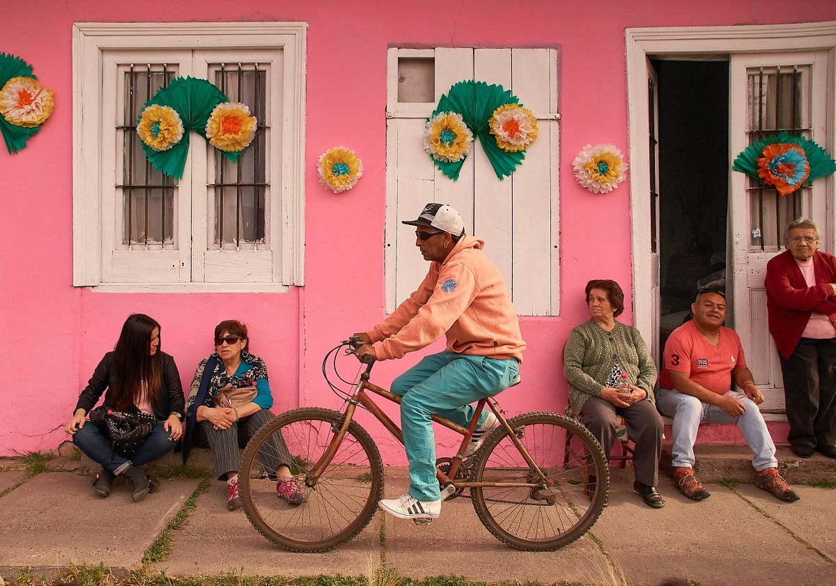 chileans sat talking on street