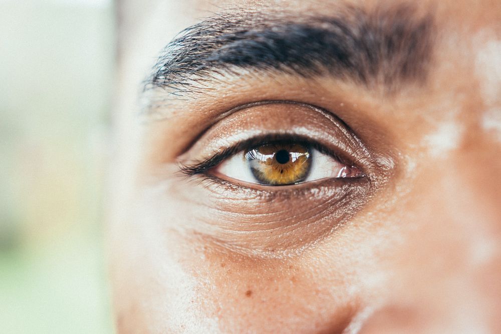 Indian man with hazel eyes