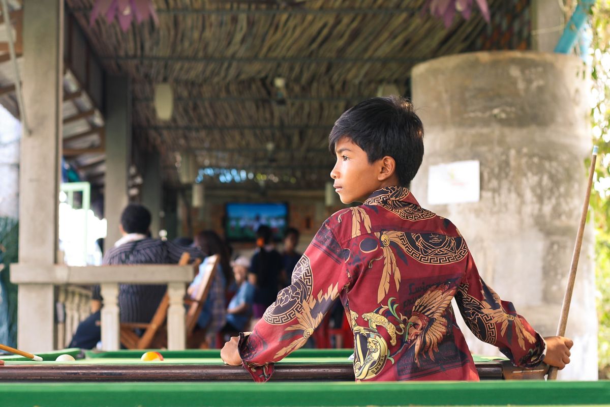 young cambodian boy in awesome shirt